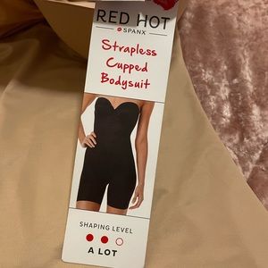 New, Spanx bodysuit. Nude color.